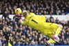 Arsenal's goalkeeper Aaron Ramsdale makes a save during the English Premier League soccer match between Everton and Arsenal at Goodison Park in Liverpool, England, Saturday, Feb. 4, 2023. (AP Photo/Jon Super)
