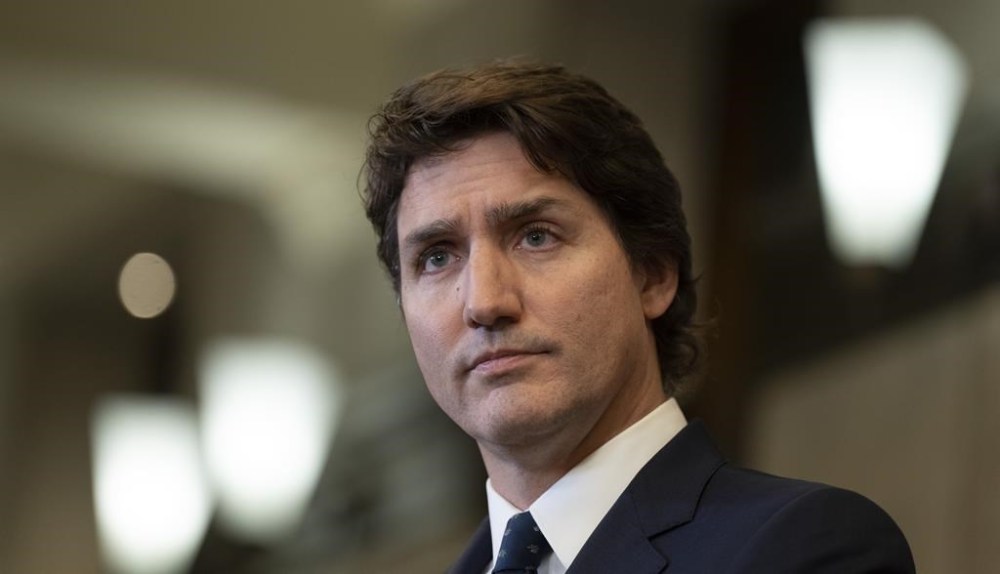 Prime Minister Justin Trudeau listens to a question during a news conference, in Ottawa, Friday, Feb.17, 2023. Nearly one year after the