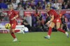 Canada forward Janine Beckie (16) attempts a shot on goal as midfielder Jessie Fleming watches during the first half of the team's SheBelieves Cup soccer match against the United States, Thursday, Feb. 16, 2023, in Orlando, Fla. THE CANADIAN PRESS/AP, Phelan M. Ebenhack