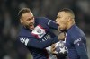 PSG's Kylian Mbappe, right, celebrates with PSG's Neymar after scores a disallowed goal during the Champions League round of 16 first leg soccer match between Paris Saint Germain and Bayern Munich, at the Parc des Princes stadium, in Paris, France, Tuesday, Feb. 14, 2023. (AP Photo/Christophe Ena)