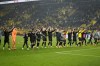Borussia Dortmund players celebrate after their win in the German Bundesliga soccer match against Hertha BSC Berlin in Dortmund, Germany, Sunday, Feb. 19, 2023. (AP Photo/Martin Meissner)