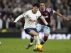 Tottenham's Son Heung-min in action against West Ham's Thilo Kehrer during the English Premier League soccer match between Tottenham Hotspur and West Ham United at Tottenham Hotspur stadium in London, Sunday, Feb. 19, 2023. (AP Photo/Kirsty Wigglesworth)