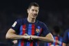 Barcelona's Robert Lewandowski celebrates after scoring his side's second goal during the Spanish La Liga soccer match between Barcelona and Cadiz CF at the Camp Nou stadium in Barcelona, Spain, Sunday, Feb. 19, 2023. (AP Photo/Joan Monfort)