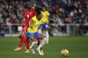 Brazil midfielder Kerolin (21) reacts after being kicked from behind by Canada midfielder Simi Awujo (8) during the first half of a SheBelieves Cup women's soccer match Sunday, Feb. 19, 2023, in Nashville, Tenn. (AP Photo/Mark Zaleski)