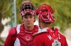 Cincinnati Reds catcher Tyler Stephenson, left, speaks with catcher Luke Maile during an MLB spring training baseball practice, Friday, Feb. 17, 2023, in Goodyear, Ariz. (AP Photo/Matt York)
