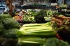 A woman shops for produce at the Granville Island Market in Vancouver, on Wednesday, July 20, 2022. Statistics Canada said Tuesday that grocery prices were up 11.4 per cent from a year ago and 11 per cent from December, even as the country's annual inflation rate slowed to 5.9 per cent in January. THE CANADIAN PRESS/Darryl Dyck
