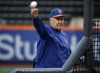 FILE - Phil Regan an assistant minor league pitching coordinator, throws batting practice with New York Mets players before a baseball game against the Miami Marlins, Friday, April 7, 2017, in New York. Phil Regan sued the New York Mets and former general manager Brodie Van Wagenen, alleging discrimination and unlawful discrimination since he was moved out as pitching coach after the 2019 season. A complaint was filed Monday, Feb. 20, 2023 in New York Supreme Court. (AP Photo/Frank Franklin II, File)