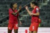 Canada's Christine Sinclair, right, celebrates with Ashley Lawrence after the opening goal against Trinidad and Tobago during a CONCACAF Women's Championship soccer match in Monterrey, Mexico, Tuesday, July 5, 2022. THE CANADIAN PRESS/AP, Fernando Llano