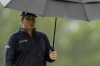 Sepp Straka of Austria walks with umbrella on the 3rd hole during the his first round on Day Two of the Dubai Desert Classic, in Dubai, United Arab Emirates, Friday, Jan. 27, 2023. (AP Photo/Kamran Jebreili)