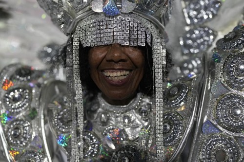 A performer from the Imperio Serrano samba school parades during Carnival celebrations at the Sambadrome in Rio de Janeiro on Sunday, Feb. 19, 2023. (AP Photo/Silvia Izquierdo)