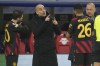 Manchester City's head coach Pep Guardiola speaks to Manchester City's Bernardo Silva, left, and Riyad Mahrez during the Champions League round of 16 first leg soccer match between RB Leipzig and Manchester City in Leipzig, Germany, Wednesday, Feb 22, 2023. (AP Photo/Michael Sohn)