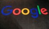 The logo of Google is displayed on a carpet at the entrance hall of Google France in Paris Monday, Nov. 18, 2019. Google says it is blocking some Canadian users from viewing news content in response to the Liberal government's controversial online news bill. THE CANADIAN PRESS/AP-Michel Euler