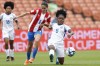 Lice Chamorro, left, of Paraguay and Deysire Salazar of Panama battle for the ball during their FIFA women's World Cup qualifier in Hamilton, New Zealand, Thursday, Feb. 23, 2023. (Martin Hunter/Photosport via AP)