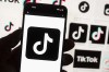 FILE - The TikTok logo is seen on a cell phone on Oct. 14, 2022, in Boston. The Kentucky Senate passed a measure Friday, Feb. 10, 2023, to ban TikTok from state government-issued devices, reflecting bipartisan concerns about the Chinese-owned social media app. (AP Photo/Michael Dwyer, File)
