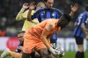 Inter Milan's goalkeeper Andre Onana holds the ball during the Champions League, round of 16, first leg soccer match between Inter Milan and Porto, at the San Siro stadium in Milan, Italy, Wednesday, Feb. 22, 2023. (AP Photo/Luca Bruno)