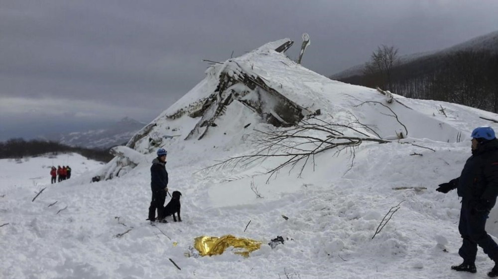 FILE - Rescuers work at the avalanche-hit Rigopiano hotel, Saturday, Jan. 21, 2017. A court in Italy on Thursday, Feb, 23, 2023, acquitted most of the defendants on trial over the deaths of 29 guests and staff when an avalanche buried an Apennine mountain hotel, Italian media, including state TV at the courthouse reported. (Corpo Nazionale Soccorso Alpino e Speleologico/The National Alpine Cliff and Cave Rescue Corps (CNSAS) via AP, File)