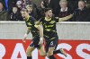 Sporting's Goncalo Inacio, right, and Sebastian Coates celebrate after scoring against during the Europa League playoff second leg soccer match between FC Midtjylland and Sporting CP at the MCH Arena in Herning, Denmark, Thursday, Feb. 23, 2023. (Bo Amstrup/Ritzau Scanpix via AP)