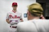 Philadelphia Phillies pitcher Noah Song poses for a picture their baseball spring training facility in Clearwater, Fla., Thursday, Feb. 23, 2023. The Phillies say pitching prospect Noah Song's transfer from active duty to Navy reserves frees him to report to the team. (AP Photo/Chris Carlson)