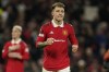 Manchester United's Lisandro Martinez celebrates at the end of the Europa League playoff second leg soccer match between Manchester United and Barcelona at Old Trafford stadium in Manchester, England, Thursday, Feb. 23, 2023. Manchester United won 2-1. (AP Photo/Dave Thompson)