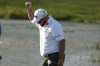 Shane Lowry, of Ireland, reacts after making a birdie putt on the 17th green during the second round of the Honda Classic golf tournament, Friday, Feb. 24, 2023, in Palm Beach Gardens, Fla. (AP Photo/Lynne Sladky)