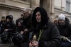 Family members and friends pay respects, during a funeral ceremony of soldier Yurii Bulharu outside the Holy Apostles Peter and Paul Church in Lviv, western Ukraine, on Saturday, Feb. 25, 2023. Bulharu died on Feb. 17, 2023, in east Ukraine. (AP Photo/Petros Giannakouris)