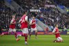 Arsenal's Leandro Trossard, right, celebrates after scoring a disallowed goal during the English Premier League soccer match between Leicester City and Arsenal at The King Power Stadium, Leicester, England, Saturday, Feb. 25, 2023. (AP Photo/Jon Super)