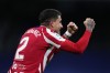 Atletico Madrid's Jose Gimenez celebrates after scoring his side's opening goal during a Spanish La Liga soccer match between Real Madrid and Atletico Madrid at the Santiago Bernabeu stadium in Madrid, Spain, Saturday, Feb. 25, 2023. (AP Photo/Manu Fernandez)
