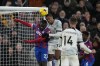 Crystal Palace's Odsonne Edouard, left, challenges for the ball with Liverpool's Joel Matip during the English Premier League soccer match between Crystal Palace and Liverpool at Selhurst Park, in London, Saturday, Feb. 25, 2023. (AP Photo/Alastair Grant)
