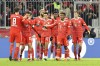 Bayern Munich players celebrate after Bayern's Kingsley Coman, second right, scored his side's second goal during the Bundesliga soccer match between Bayern Munich and Union Berlin at the Allianz Arena in Munich, Germany, Sunday, Feb.26, 2023. (AP Photo/Alexandra Beier )