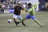 Seattle Sounders midfielder Joao Paulo, right, attempts to kick the ball from Colorado Rapids forward Michael Barrios during the first half of a season opening MLS soccer match, Sunday, Feb. 26, 2023, in Seattle. (AP Photo/John Froschauer)