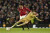 Barcelona's Robert Lewandowski, foreground, is challenged by Manchester United's Casemiro during the Europa League playoff second leg soccer match between Manchester United and Barcelona at Old Trafford stadium in Manchester, England, Thursday, Feb. 23, 2023. (AP Photo/Dave Thompson)