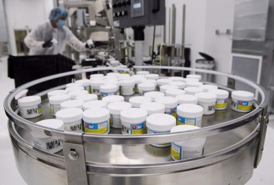 Phonea Inc. says chief executive Greg Guyatt has resigned. Employees work with cannabis products at the packaging and extraction facility in Vaughan, Ont., on Wednesday, Dec. 19, 2018. THE CANADIAN PRESS/Nathan Denette