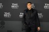 Moroccan player Achraf Hakimi poses on the green carpet before the ceremony of the Best FIFA Football Awards in Paris, France, Monday, Feb. 27, 2023. (AP Photo/Michel Euler)