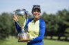 Paula Reto of South Africa holds the trophy after winning the CP Women's Open in Ottawa, on Sunday, Aug. 28, 2022. The CP Women's Open is returning to Calgary. Earl Grey Golf Club will host the Canadian national women's golf championship from July 22-28, 2024. THE CANADIAN PRESS/Justin Tang