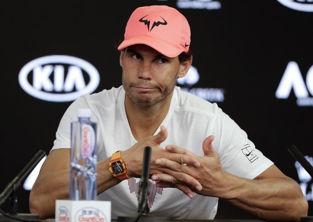 FILE - In this Jan. 23, 2018, file photo, Spain's Rafael Nadal answers questions at a press conference after retiring injured from his quarterfinal against Croatia's Marin Cilic at the Australian Open tennis championships in Melbourne, Australia. Rafael Nadal pulled out of the upcoming Indian Wells hard-court tournament on Tuesday, Feb. 28, 2023, because of the left hip flexor injury that has sidelined him since the Australian Open. (AP Photo/Mark Baker, File)