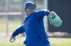 Chicago Cubs' Seiya Suzuki throws during a spring training baseball workout Wednesday, Feb. 15, 2023, in Mesa. (AP Photo/Morry Gash)
