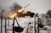 Ukrainian military fires from a multiple rocket launcher at Russian positions in the Kharkiv area, Ukraine, Saturday, Feb. 25, 2023. The Biden administration declared its Ukraine solidarity with fresh action as well as strong words on Friday, piling sweeping new sanctions on Moscow and approving a new $2 billion weapons package to re-arm Kyiv a year after Russia's invasion. (AP Photo/Vadim Ghirda)
