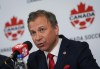 Canada Soccer president Nick Bontis speaks during a news conference, in Vancouver, on Sunday, June 5, 2022. Canada Soccer has been asked to deliver a copy of its controversial agreement with Canadian Soccer Business (CSB) to the Standing Committee on Canadian Heritage by Friday. THE CANADIAN PRESS/Darryl Dyck
