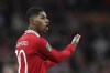 Manchester United's Marcus Rashford gestures during the English League Cup final soccer match between Manchester United and Newcastle United at Wembley Stadium in London, Sunday, Feb. 26, 2023. (AP Photo/Scott Heppell)