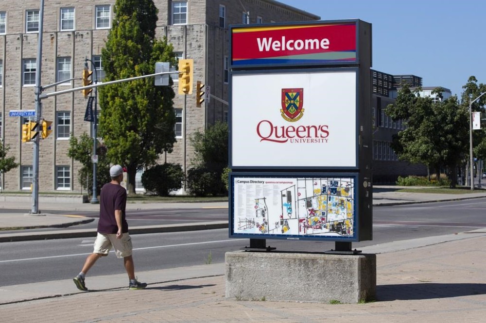 Queen's University signage is seen in Kingston, Ont., Friday, Aug. 14, 2020. A northern Ontario health authority serving remote coastal communities and the university say they are developing a culturally-informed program that will prepare thousands of Indigenous youth for careers in health-care by 2030. THE CANADIAN PRESS/Lars Hagberg