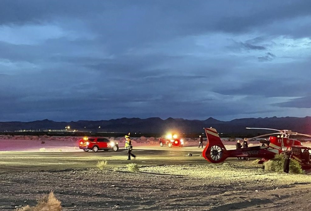 FILE - This image provided by Boulder City communications manager Lisa LaPlante shows a Grand Canyon tour helicopter after a Tuesday, Dec. 27, 2022, crash described as a