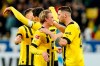 Dortmund's players celebrate during a German Bundesliga soccer match between TSG 1899 Hoffenheim and Borussia Dortmund in Sinsheim, Germany, Saturday, Feb. 25, 2023. (Uwe Anspach/dpa via AP)