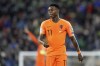 FILE - Netherlands' Quincy Promes looks on during the Euro 2020 group C qualifying soccer match between Northern Ireland and the Netherlands at Windsor Park, Belfast, Northern Ireland, Saturday, Nov. 16, 2019. On Friday, March 3, 2023, prosecutors urged a Dutch court to convict Netherlands international Quincy Promes of aggravated assault and sentence him to two years imprisonment for allegedly stabbing his nephew in the knee at a party. (AP Photo/Peter Morrison, File)