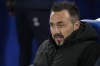 FILE - Brighton's head coach Roberto De Zerbi ahead the English Premier League soccer match between Brighton and Nottingham Forest at the Falmer stadium in Brighton, England, Tuesday, Oct. 18, 2022. De Zerbi won’t be on the touchline on Saturday, March 4, 2023 for the game against West Ham as a result of a one-match suspension for abusive behavior toward a match official. The Football Association announced the touchline ban and a fine of 15,000 pounds ($18,000) for De Zerbi’s actions following a 1-0 loss to Fulham on Feb. 18. (AP Photo/Alastair Grant, File)