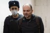 FILE - Russian opposition activist Vladimir Kara-Murza is escorted to a hearing in a court in Moscow, Russia, Feb. 8, 2023. The U.S. has imposed sanctions and visa restrictions on six Russian officials and an expert witness involved in the incarceration of Vladimir Kara-Murza, a Russian opposition leader who has been imprisoned in Moscow since April for speaking out against Russia's invasion of Ukraine. (AP Photo, File)