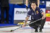 Team McEwen lead Colin Hodgson throws against Team Jacobs during Draw 16 of the 2021 Canadian Olympic curling trials in Saskatoon, Friday, November 26, 2021. THE CANADIAN PRESS/Liam Richards