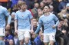 Manchester City's Phil Foden, right, celebrates after scoring his side's first goal during the English Premier League soccer match between Manchester City and and Newcastle, at the Etihad stadium in Manchester, England, Saturday, March 4, 2023. (AP Photo/Dave Thompson)
