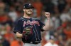FILE - Atlanta Braves relief pitcher Will Smith celebrates an out against the Houston Astros during the ninth inning of Game 1 in baseball's World Series between the Houston Astros and the Atlanta Braves Tuesday, Oct. 26, 2021, in Houston. Smith agreed to a $1.5 million, one-year contract with the Texas Rangers on Saturday, March 4, 2023, and will report to spring training. (AP Photo/David J. Phillip, File)