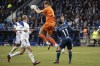 Schalke's goalkeeper Ralf Fahrmann catches the ball during the German Bundesliga soccer match between VfL Bochum and FC Schalke 04 in Bochum, Germany, Saturday, March 4, 2023. (Bernd Thissen/dpa via AP)