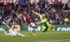 Crystal Palace's Joachim Andersen, left, scores an own goal during the English Premier League soccer match between Crystal Palace and Aston Villa at Villa Park, Birmingham, England, Saturday March 4, 2023. (Jacob King/PA via AP)